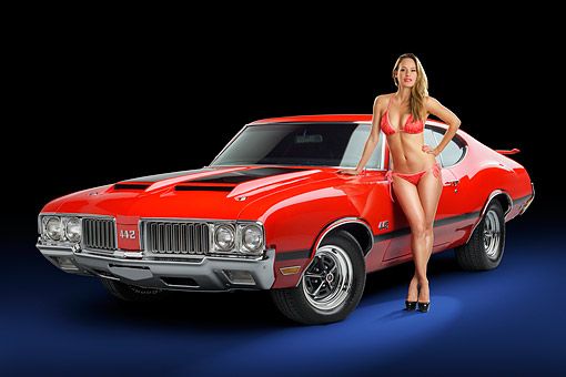 WMN 03 RK0390 01 © Kimball Stock 1970 Oldsmobile 442 Red 3/4 Front View In Stud…