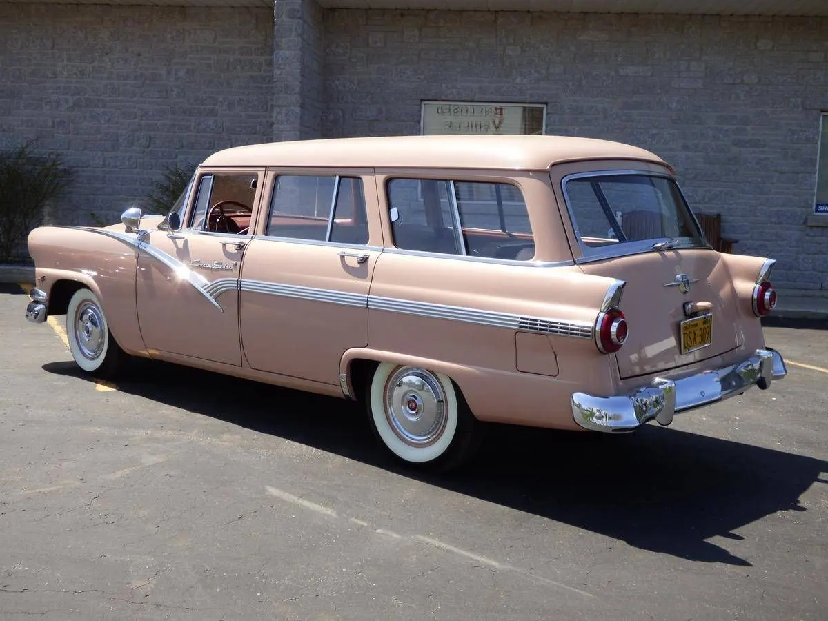 Pink and cream 1956 Ford station wagon
