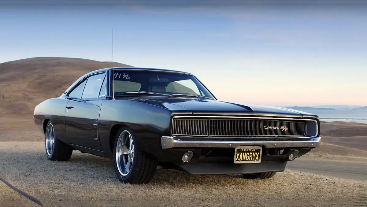 Black 1968 Dodge Charger on a hillside