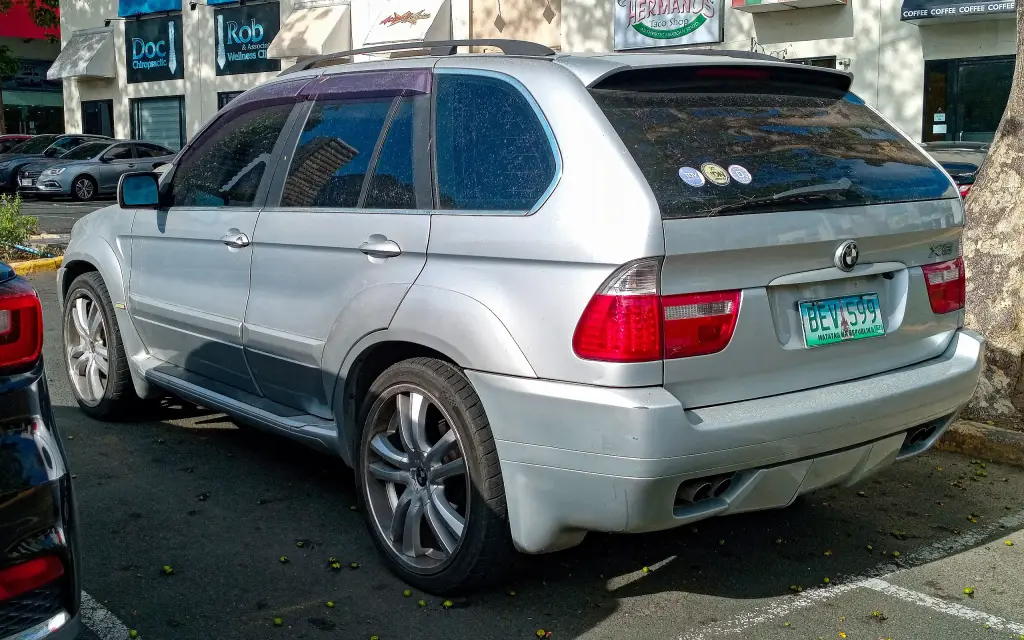 Silver BMW X5 E53 rear view