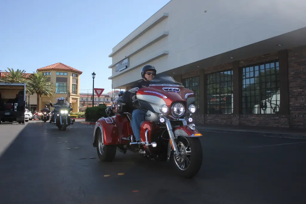 Red and silver Harley-Davidson Tri Glide