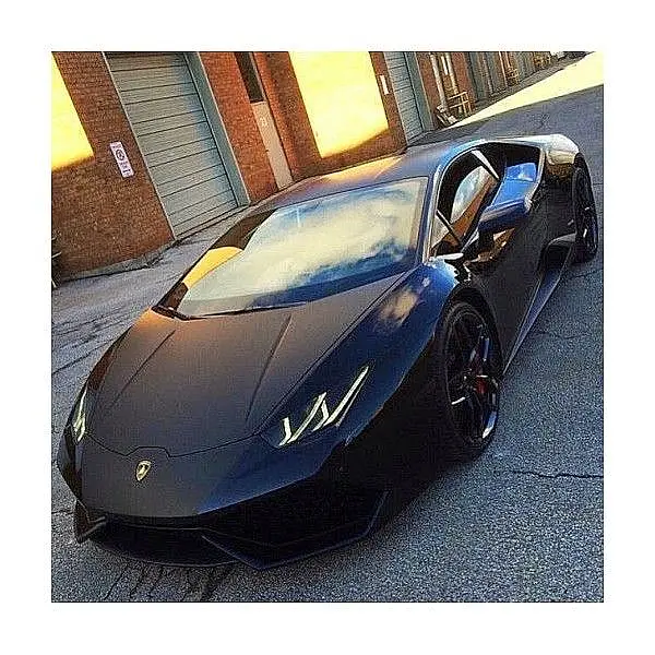 Black Lamborghini Huracán on a street