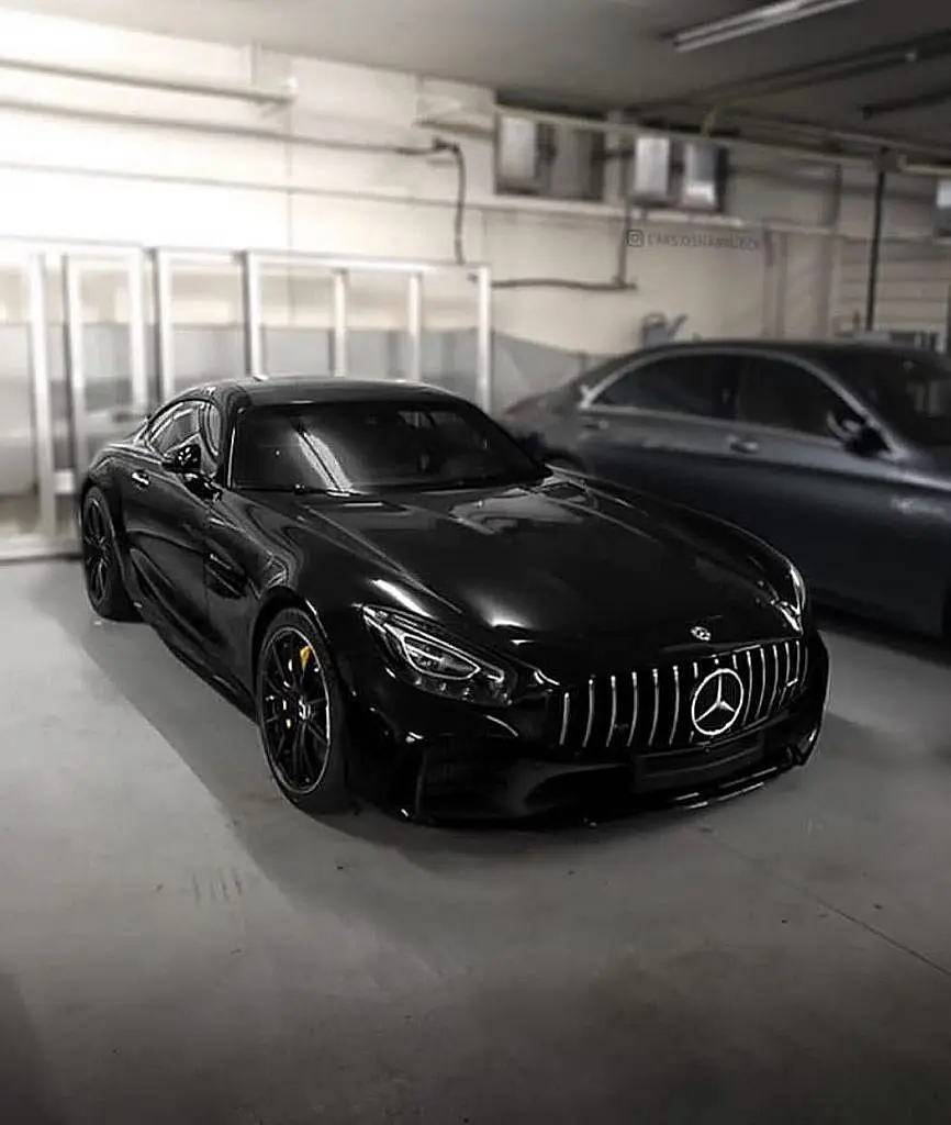 Black Mercedes-AMG GT in a garage
