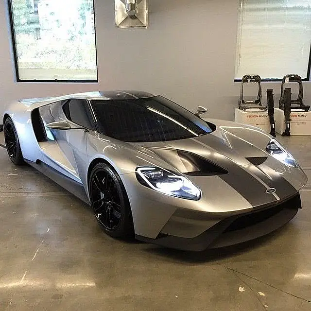 Silver Ford GT in a showroom