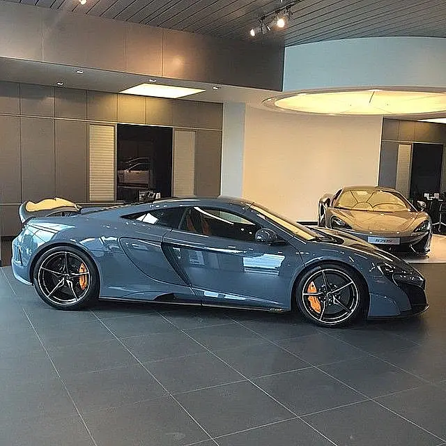 Grey-blue McLaren 650S in a showroom