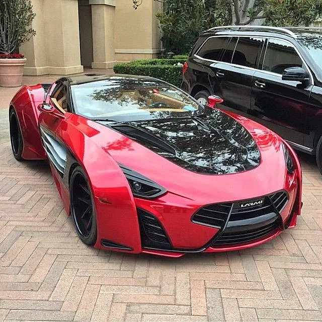 Red concept coupe with a black bonnet and wide arches