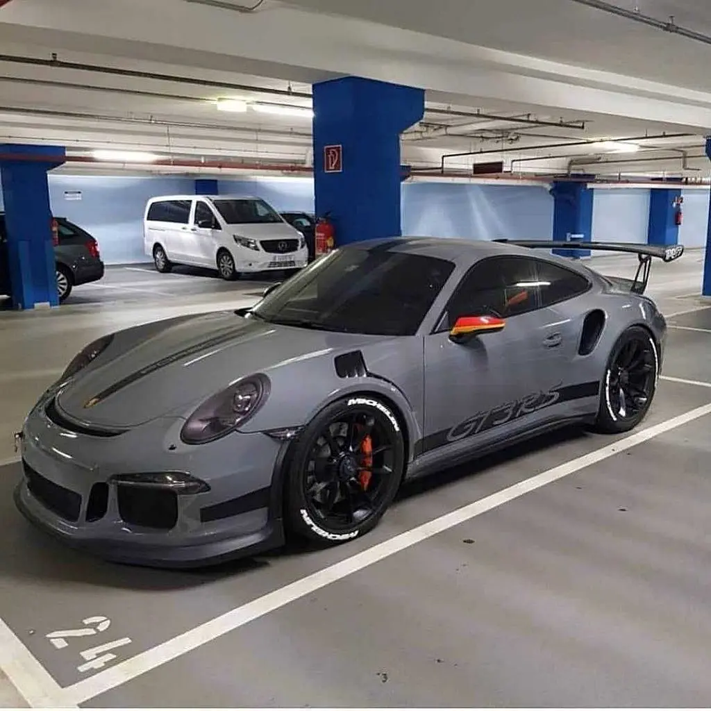 Grey Porsche 911 GT3 RS in a car park