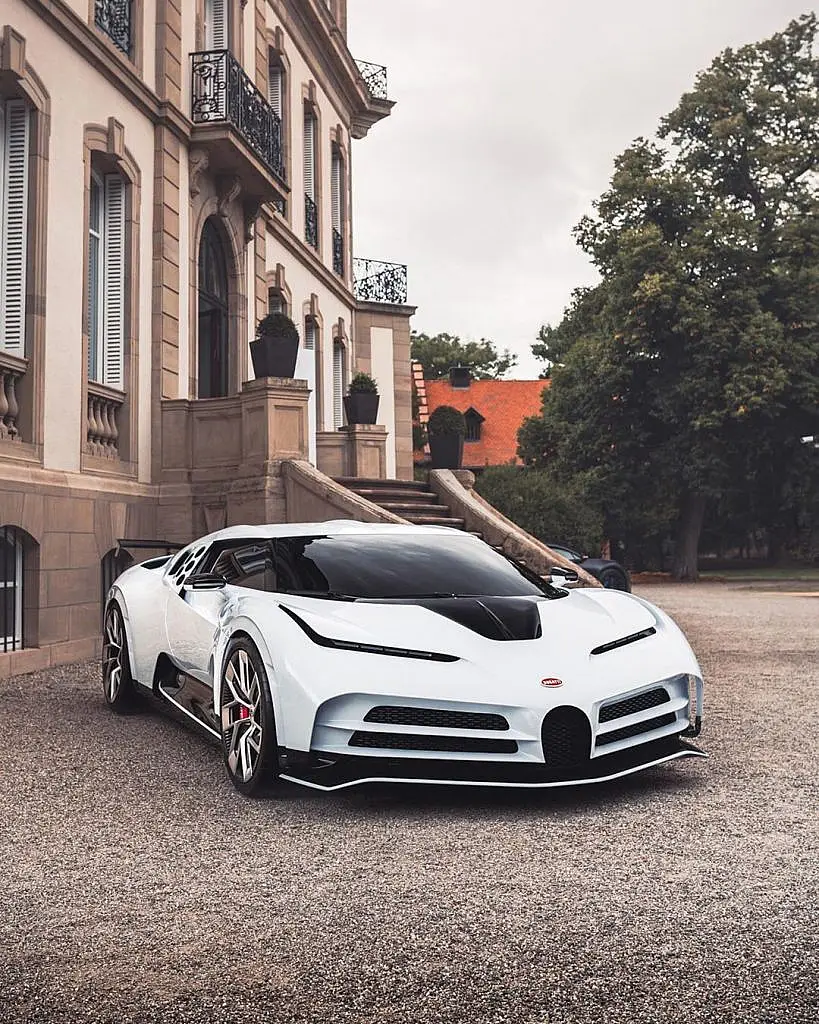 White Bugatti Centodieci in front of a mansion