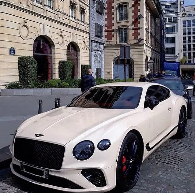 White Bentley Continental GT in a Paris street