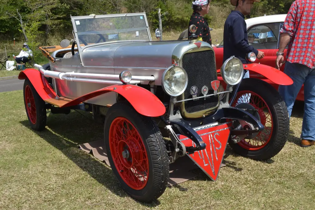 1925 Alvis 12/50 TE roadster with polished aluminium body, red wings and red wire wheels