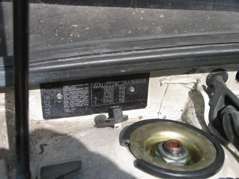 VIN stamped in the firewall of an Audi 80