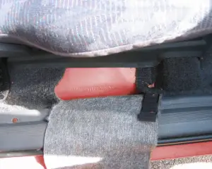 VIN plate on the body beside the seat of a GM T-platform car